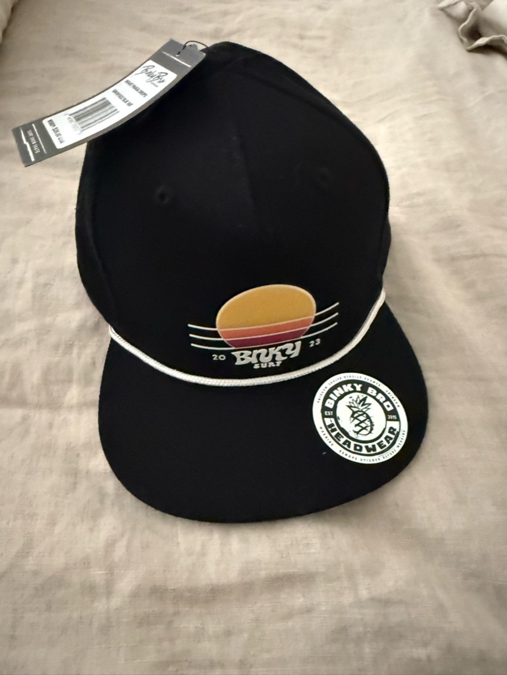 Binky Bro Infant “Panga Drops” Black Rope-Front Cap